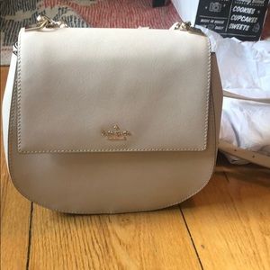 White cream kate spade crossbody bag